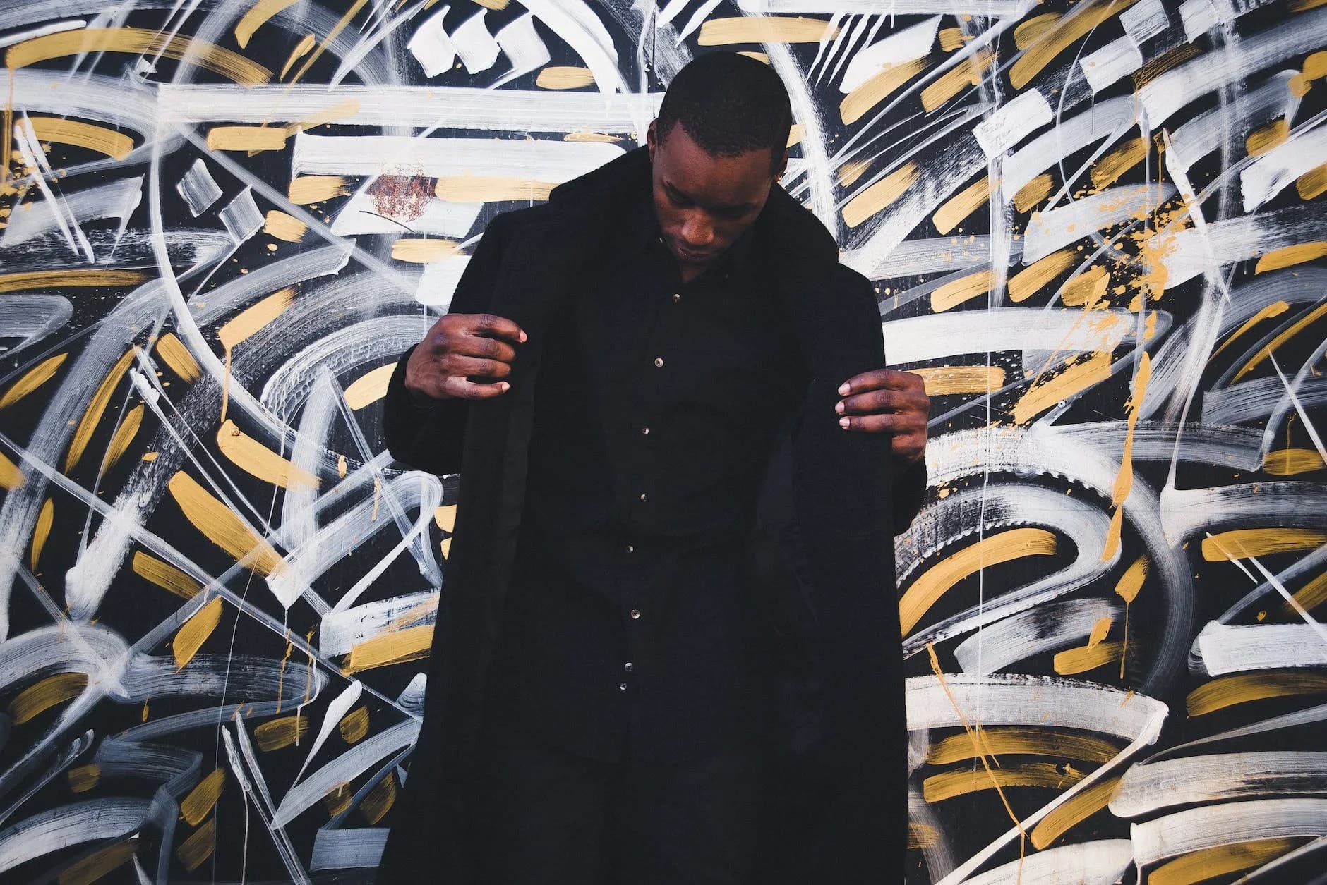 man wearing black coat