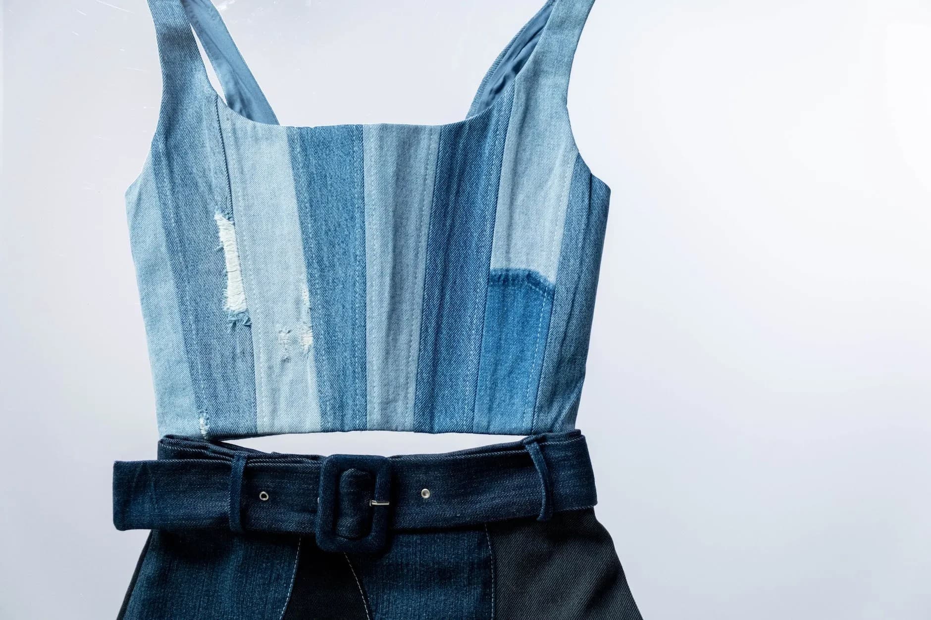 close up of a blue denim dress