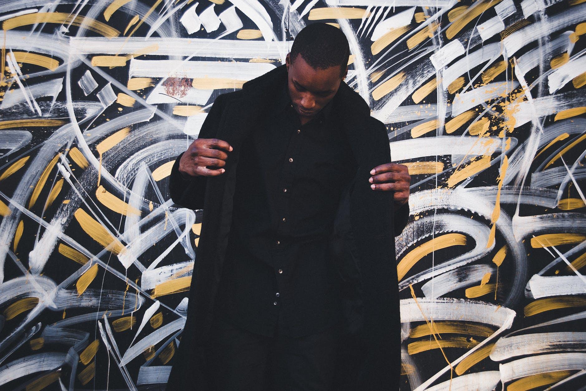 man wearing black coat