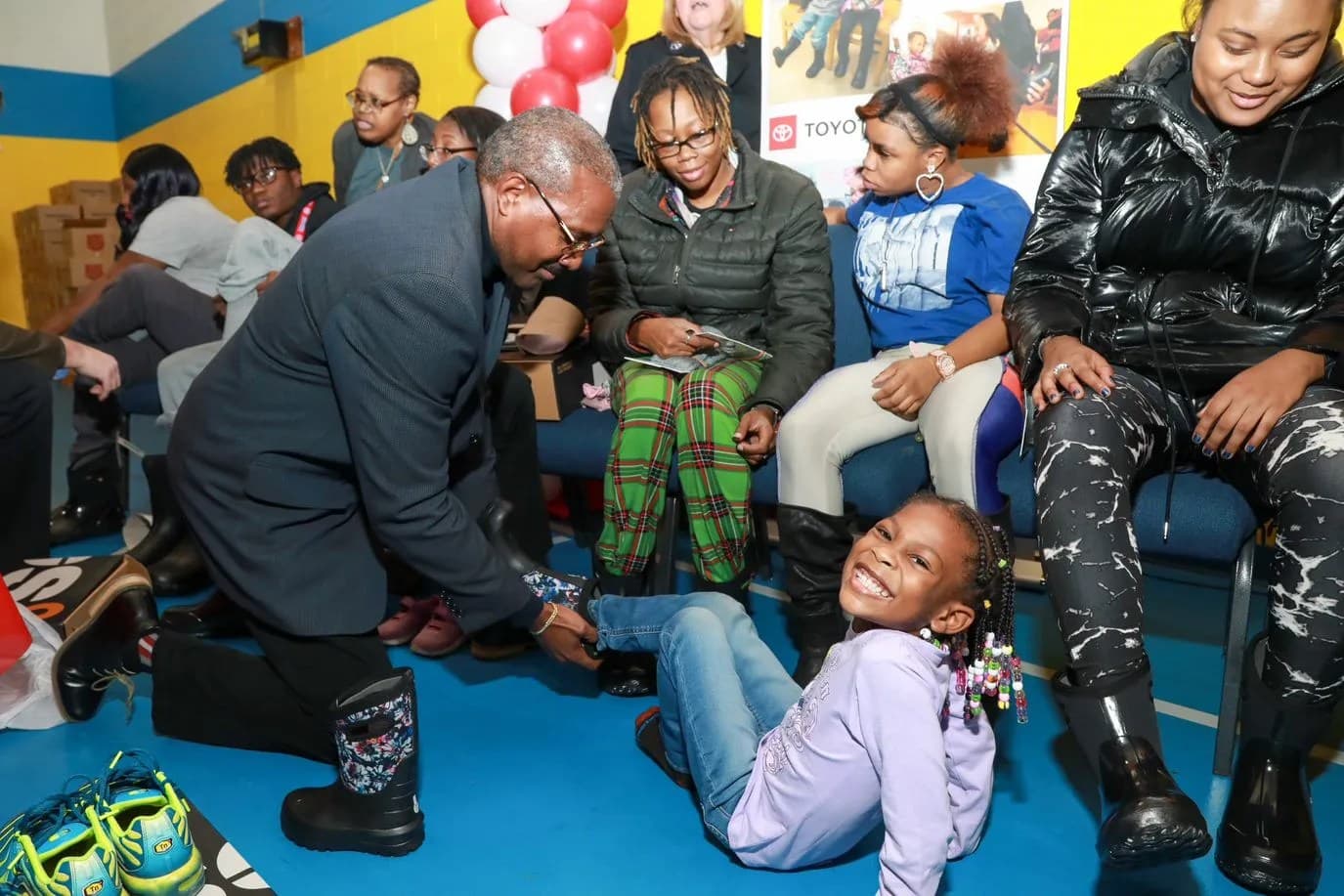 Detroit’s Grandale Families Receive New Winter Boots and Socks from Toyota