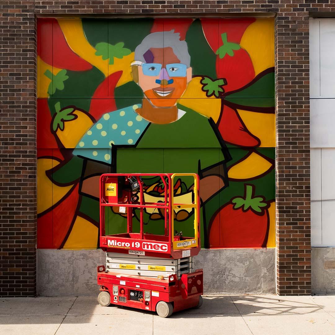Detroit Muralist at work: Sheefy photo by Chris Adams